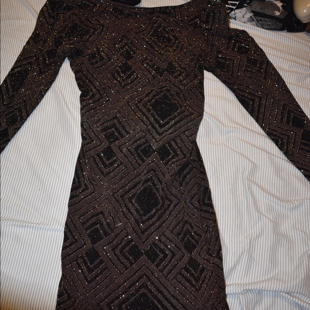 Black and Bronzed geometric patterned mini dress.